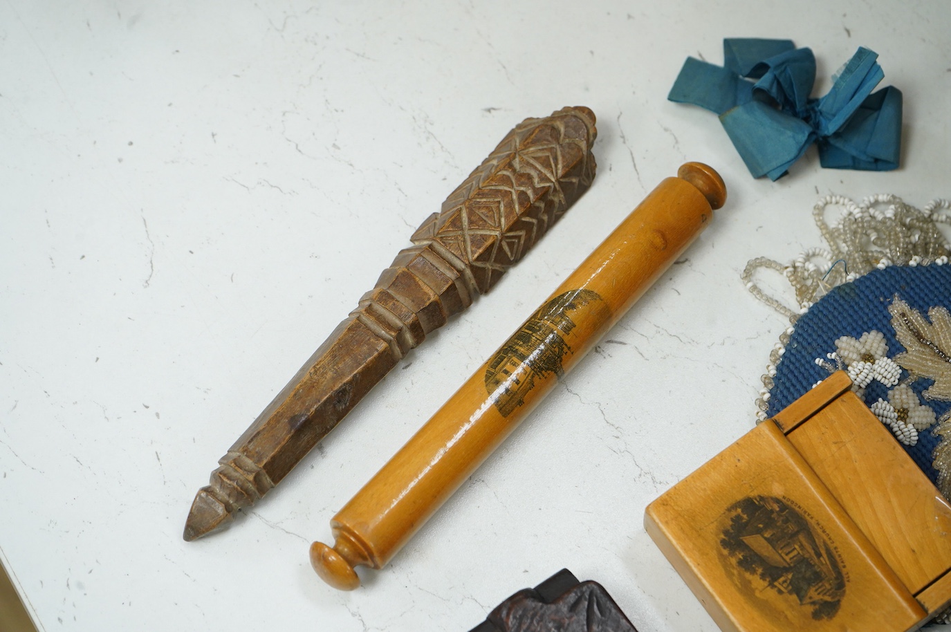A collection of Victorian and later sundry items to include beadwork purse, watch holder, a kris handle and other treen
